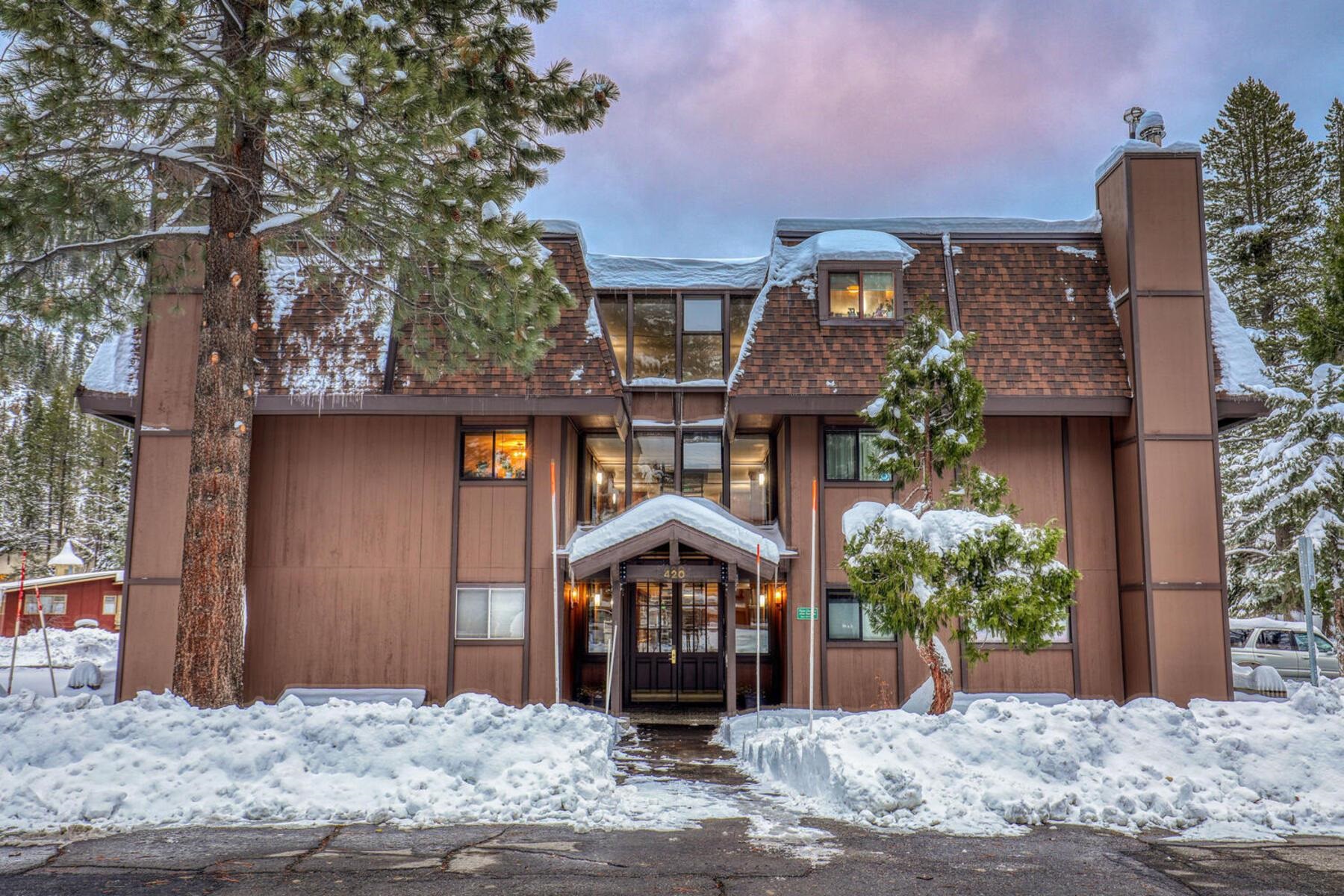420 Shirley Cyn Road, Unit 29 Olympic Valley, CA 96146 - Photo 21 of 27 a front view of a house with a yard