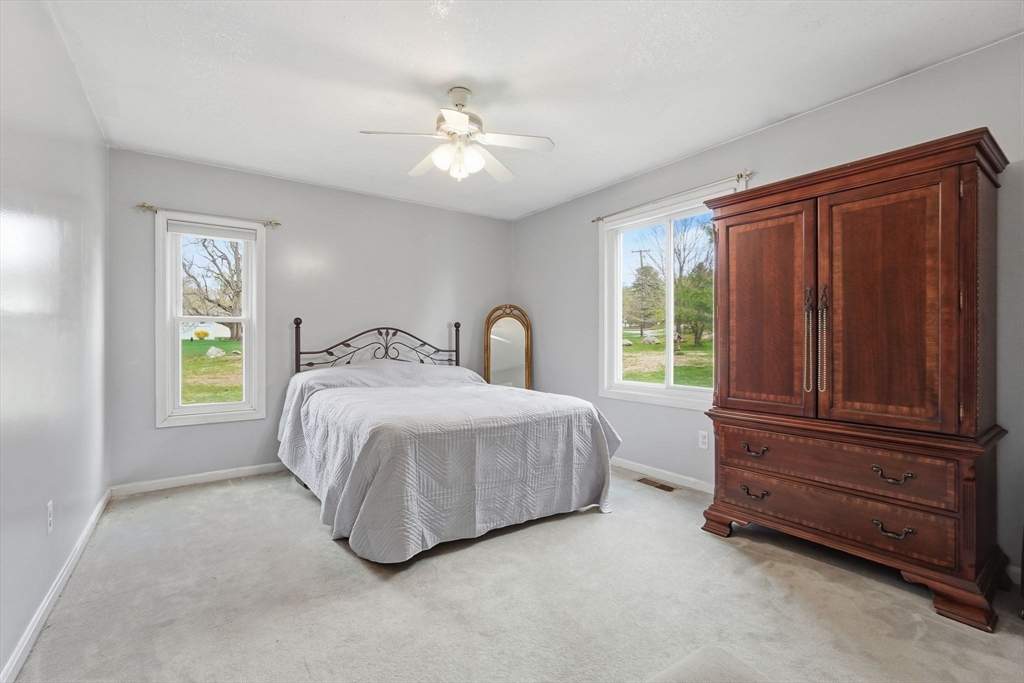12 Pond Brook Road Huntington, MA 01050 - Photo 23 of 38 a spacious bedroom with a bed and a window