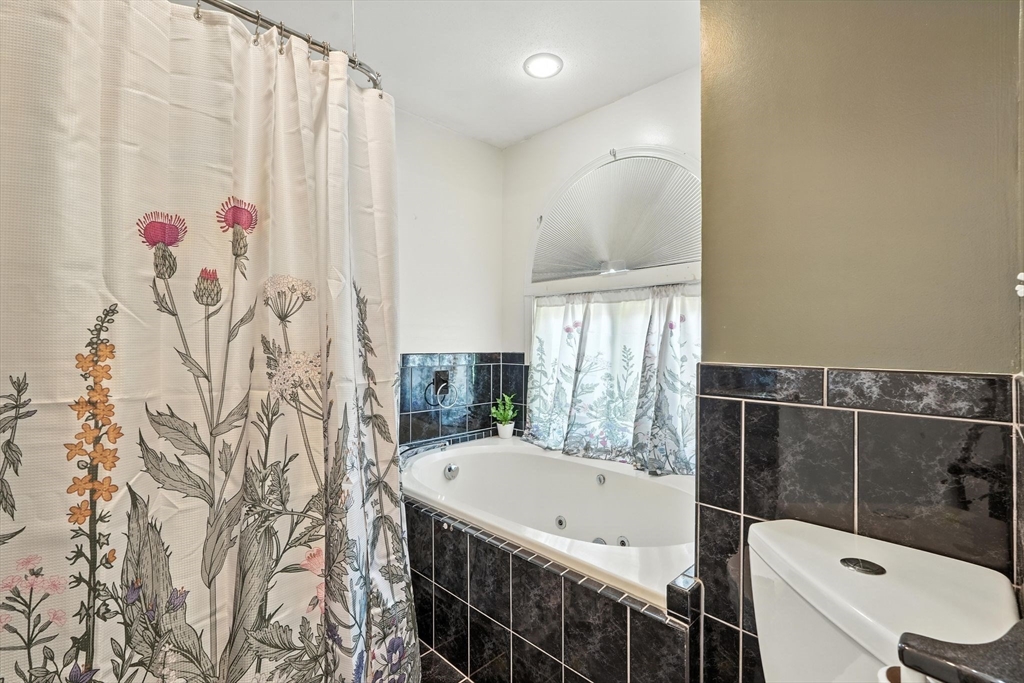 12 Pond Brook Road Huntington, MA 01050 - Photo 26 of 38 a bathroom with a bathtub and shower