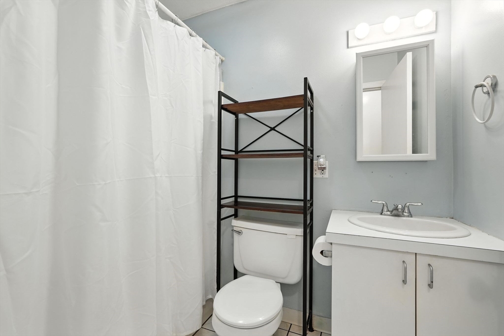 12 Pond Brook Road Huntington, MA 01050 - Photo 27 of 38 a bathroom with a sink a toilet and mirror