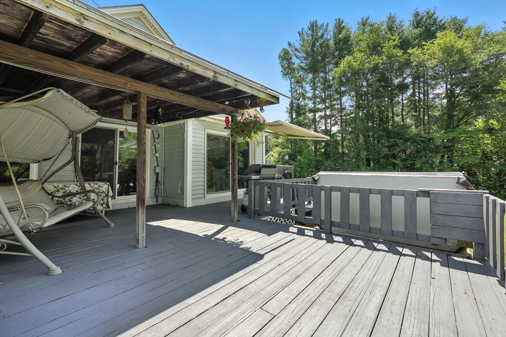 12 Pond Brook Road Huntington, MA 01050 - Photo 8 of 38 a view of balcony with wooden floor and outdoor seating