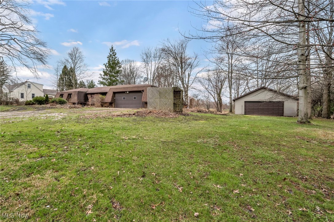 2680 Orchard Ext Road Wickliffe, OH 44092 - Photo 3 of 30 View of yard with an outbuilding