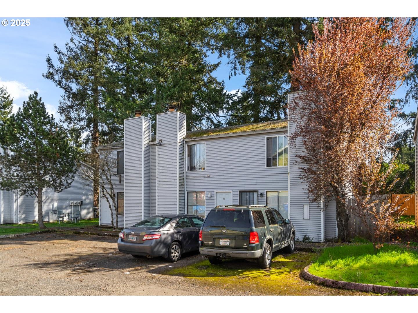 15 Northeast 127th Avenue Portland, OR 97230 - Photo 3 of 8 a car parked in front of white house