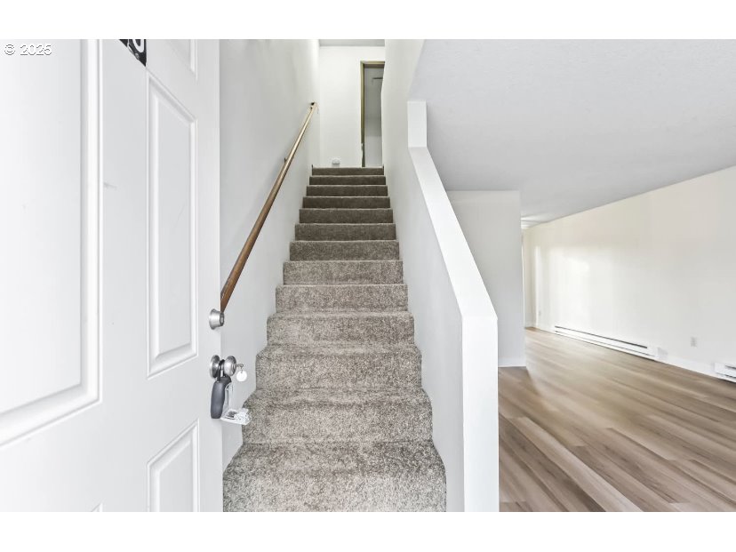 15 Northeast 127th Avenue Portland, OR 97230 - Photo 5 of 8 a view of entryway and hall with wooden floor