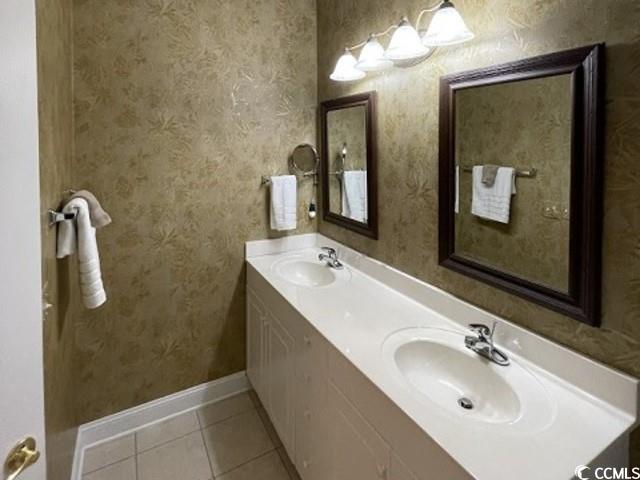 1008 Ray Costin Way, Unit 310 Murrells Inlet, SC 29576 - Photo 23 of 40 Bathroom featuring vanity and tile patterned floors