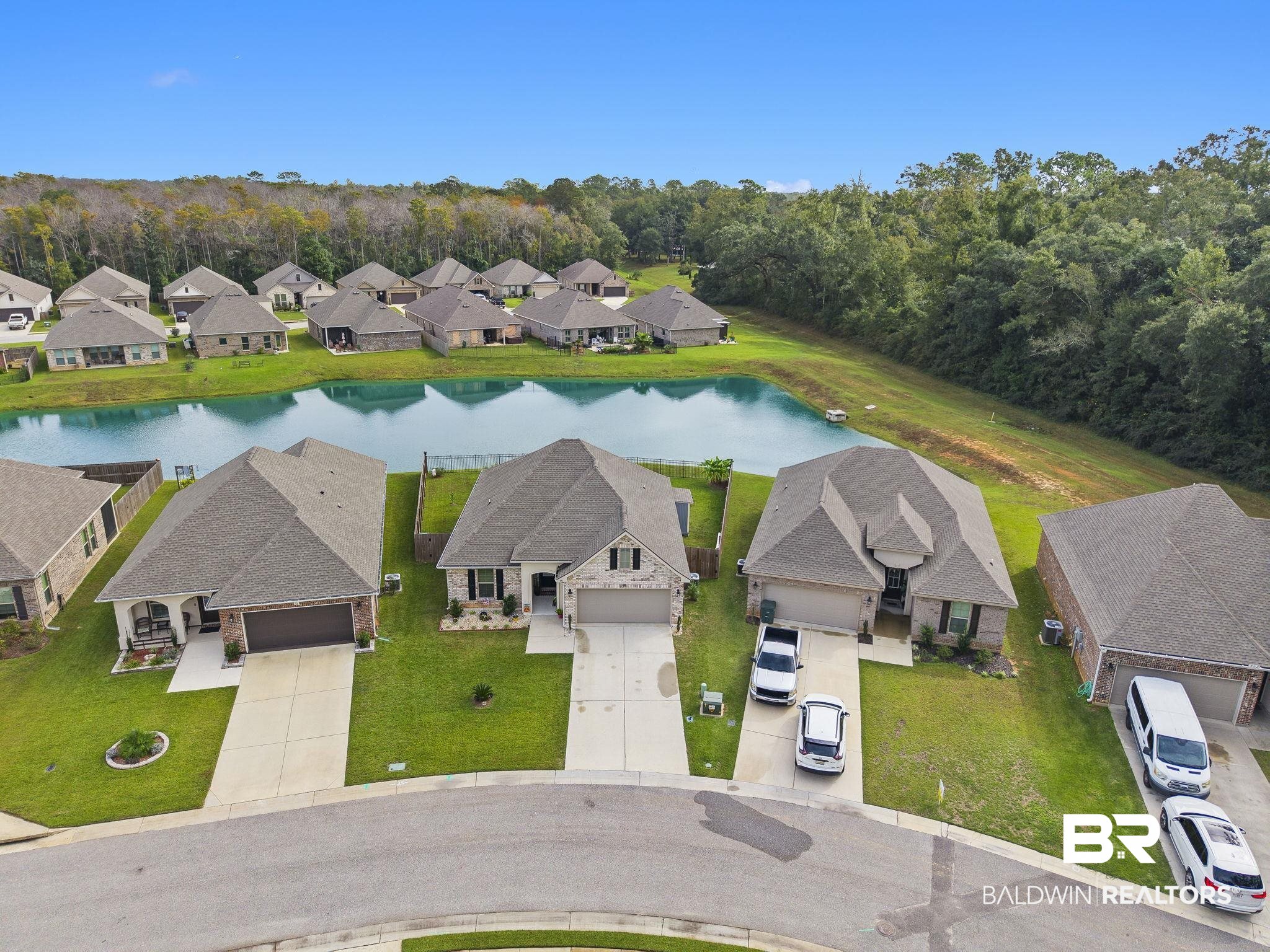 910 Gibson Court Foley, AL 36535 - Photo 54 of 66 Drone / aerial view with a water view