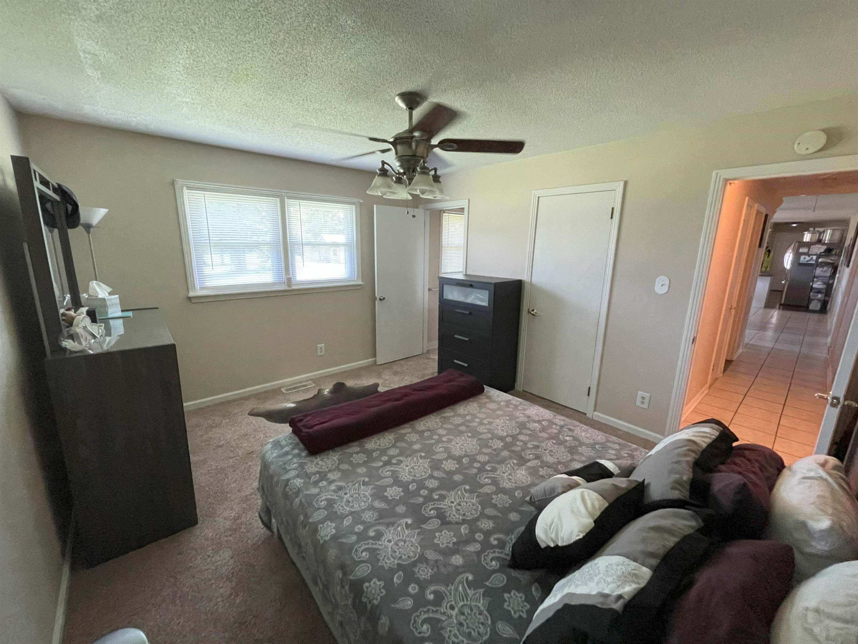 40 Wilde Road Jackson, TN 38301 - Photo 5 of 11 a bedroom with a bed and a mirror