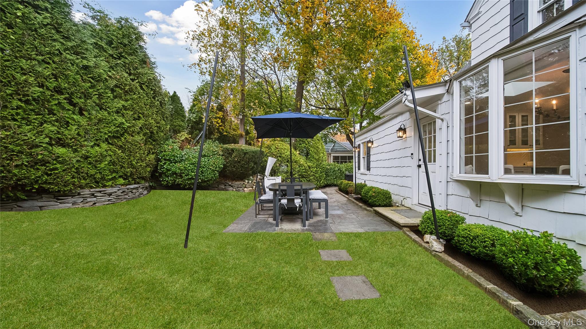 305 Nassau Avenue Manhasset, NY 11030 - Photo 27 of 27 a view of a house with a yard