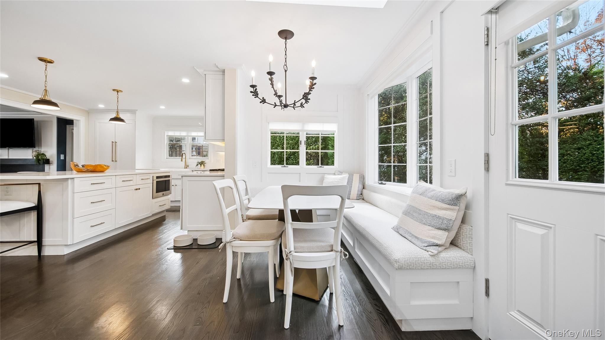 305 Nassau Avenue Manhasset, NY 11030 - Photo 8 of 27 a living room with furniture and a large window