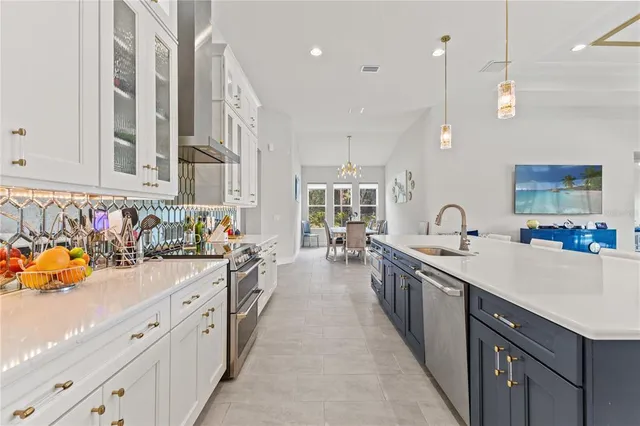 a living room with furniture a rug and a window