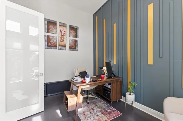 a white bath tub sitting next to a shower