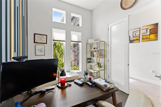 a bathroom with a double vanity sink mirror and bathtub