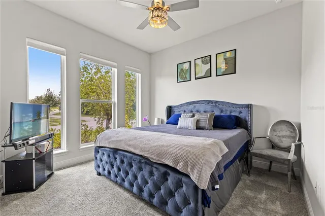 a view of swimming pool with a patio and a yard