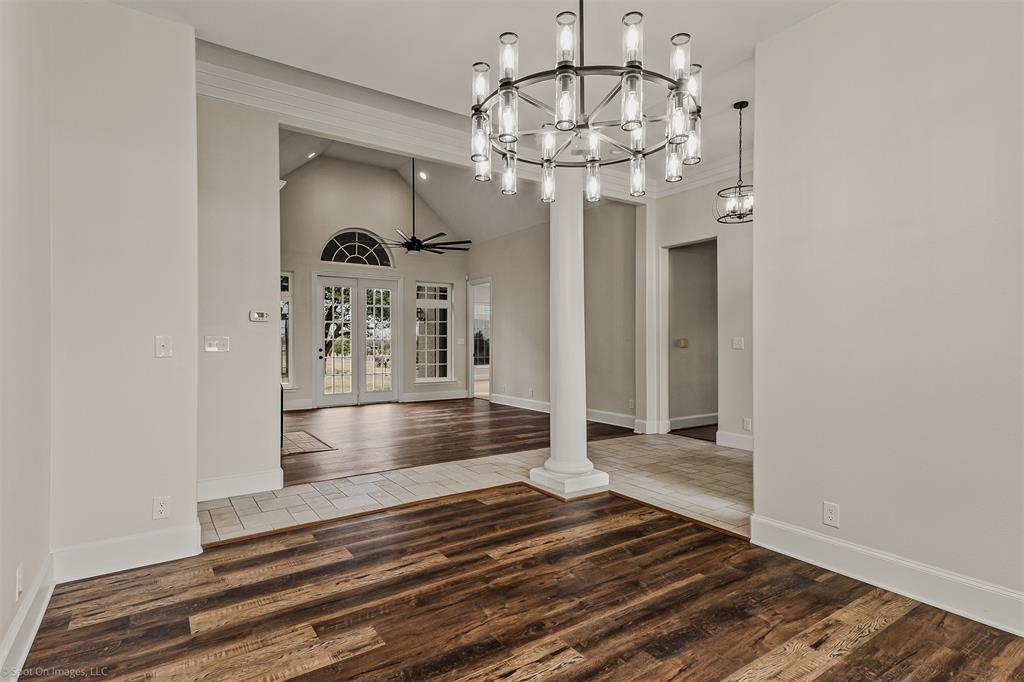 15183 Valley View Forney, TX 75126 - Photo 14 of 38 a view of a chandelier and wooden floor