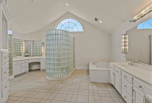 a bathroom with a sink a toilet and bathtub