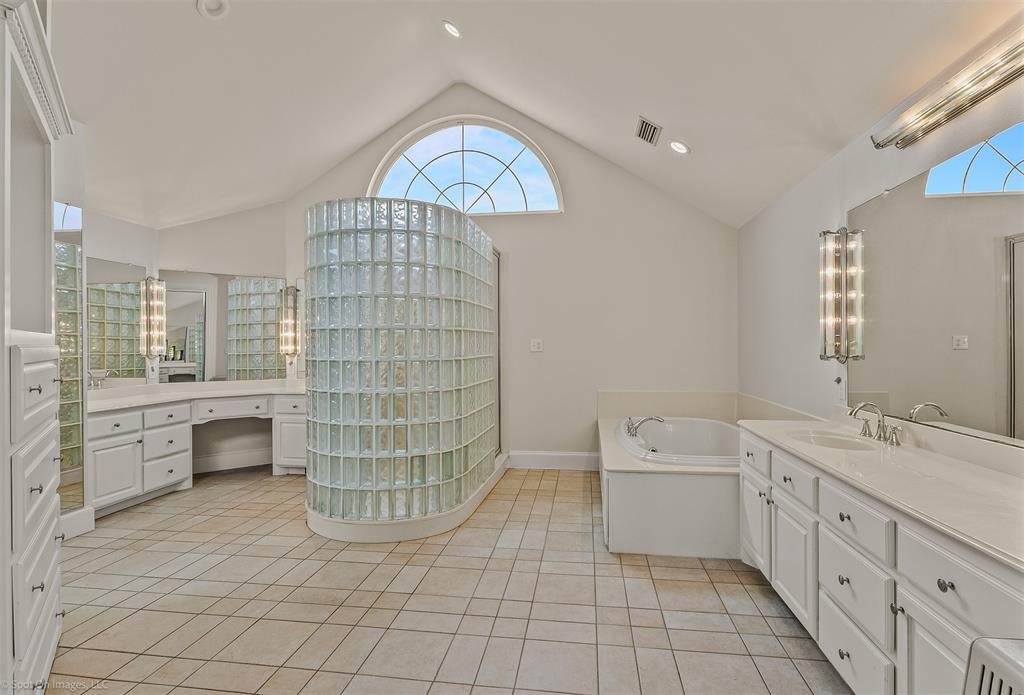 15183 Valley View Forney, TX 75126 - Photo 17 of 38 a bathroom with a sink a toilet and bathtub