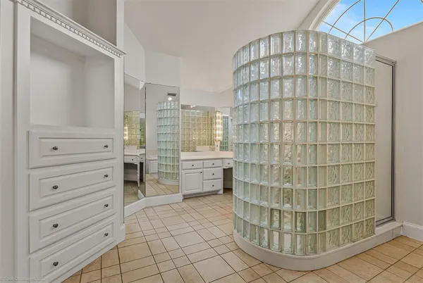 a view of walk in closet and window