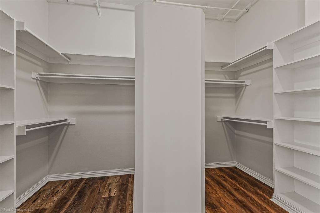 15183 Valley View Forney, TX 75126 - Photo 19 of 38 a room with walk in closet and wooden floor