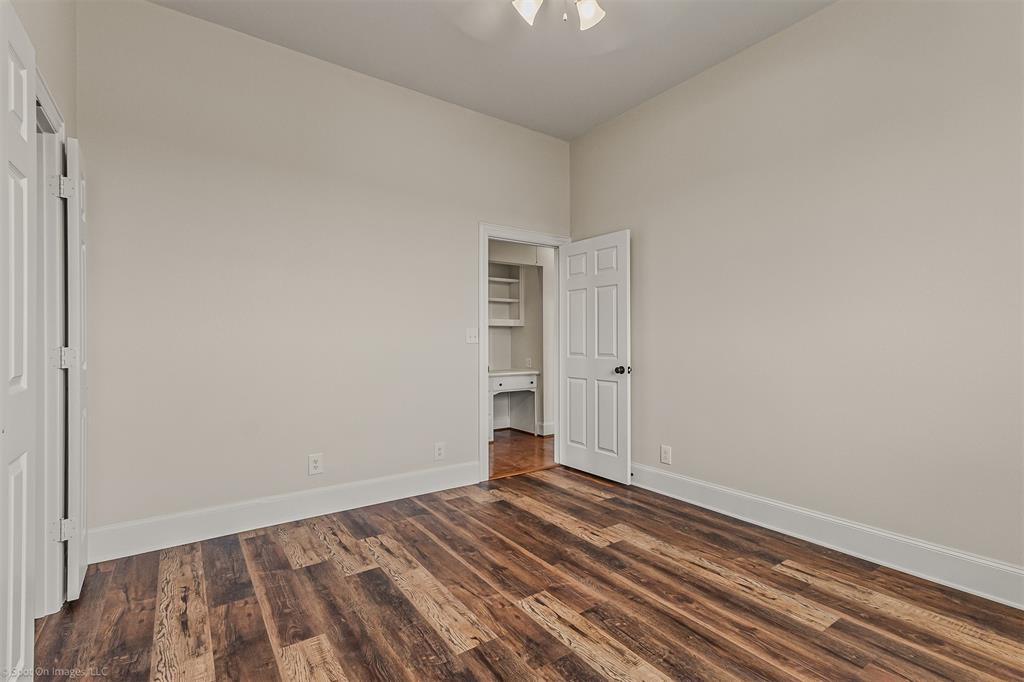 15183 Valley View Forney, TX 75126 - Photo 22 of 38 a view of a room with wooden floor and closet
