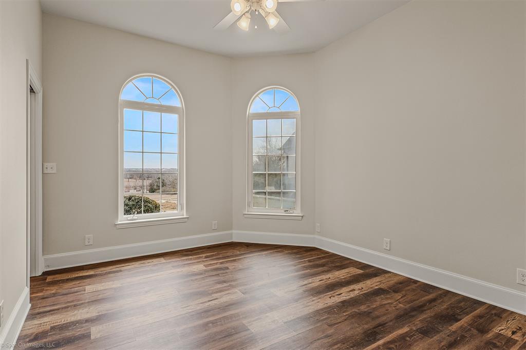 15183 Valley View Forney, TX 75126 - Photo 24 of 38 wooden floor in an empty room with a window