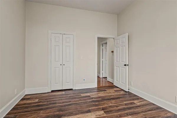 a view of a livingroom with wooden floor