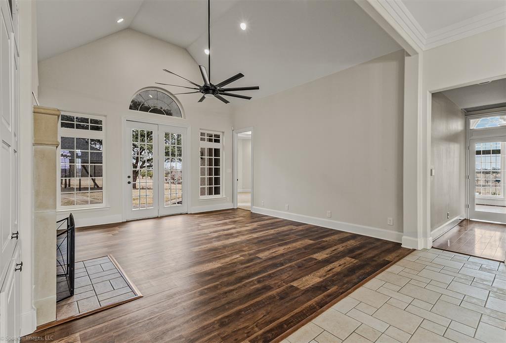 15183 Valley View Forney, TX 75126 - Photo 6 of 38 a view of an empty room with window and wooden floor