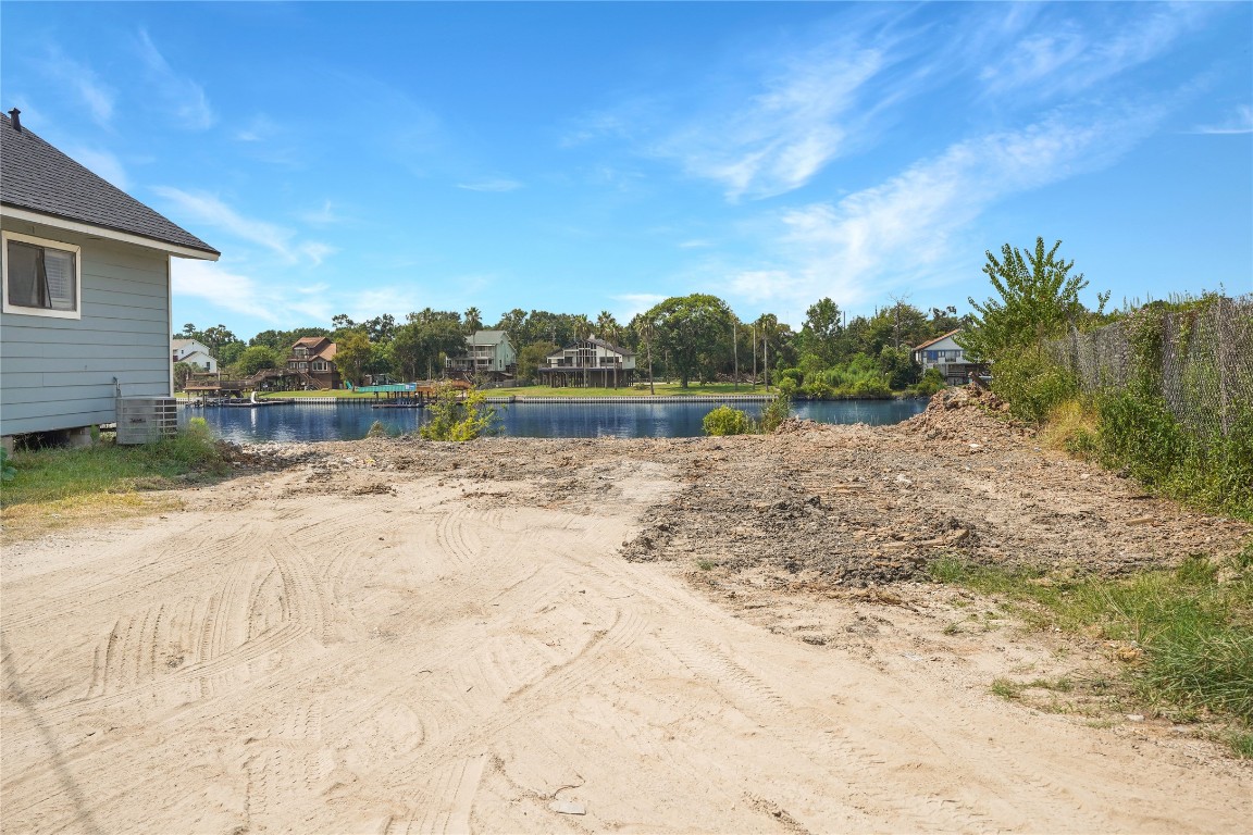 207 Riverside Street Highlands, TX 77562 - Photo 12 of 29 a view of lake with mountain