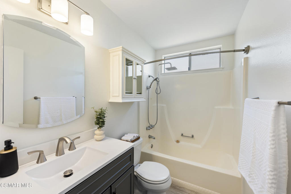 14773 Stanford Street Moorpark, CA 93021 - Photo 18 of 26 a bathroom with a sink a toilet and shower