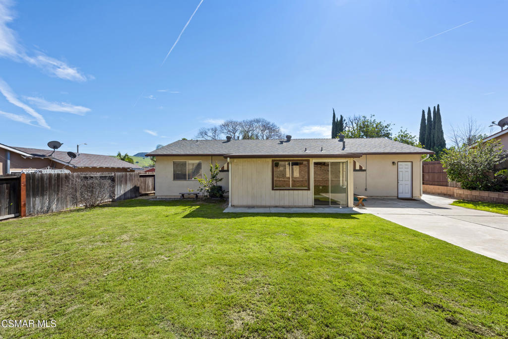 14773 Stanford Street Moorpark, CA 93021 - Photo 23 of 26 a view of a yard with a house and a big yard