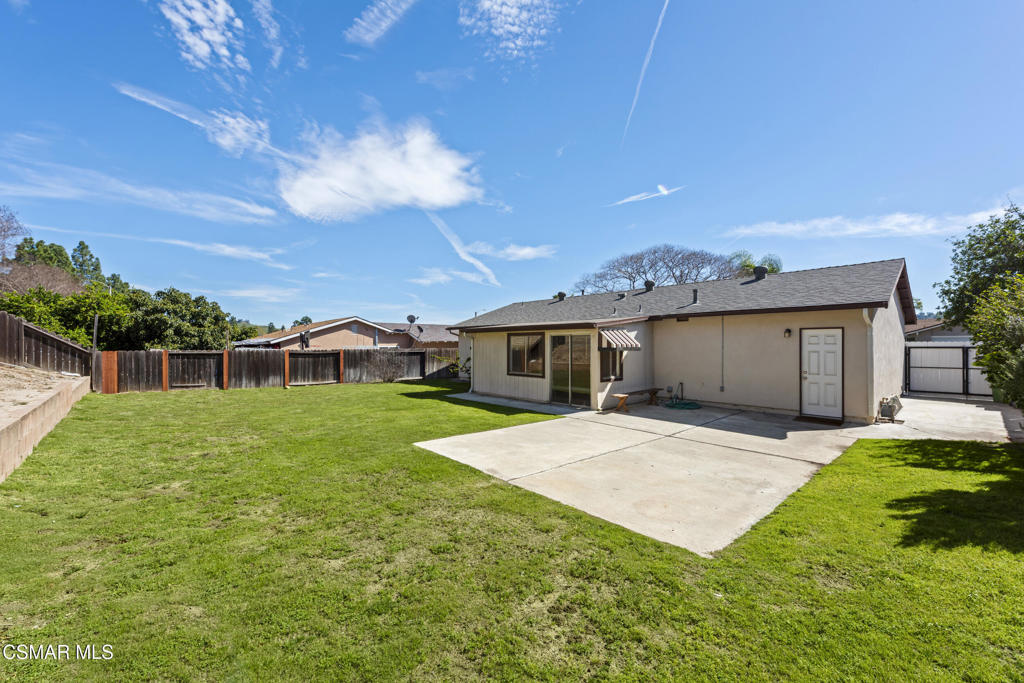 14773 Stanford Street Moorpark, CA 93021 - Photo 25 of 26 a front view of a house with a yard and garage