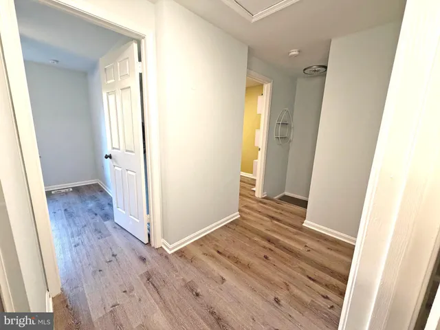 a view of wooden floor in an empty room