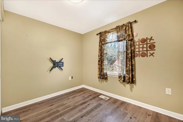 a view of a room with rack on the wall