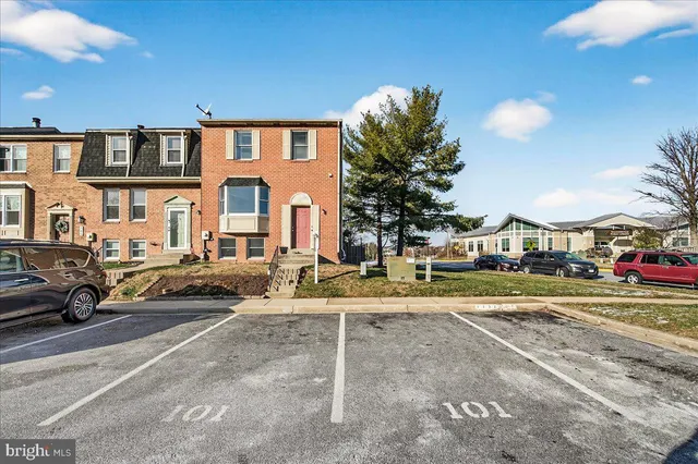 a picture of a bench in front of a microwave