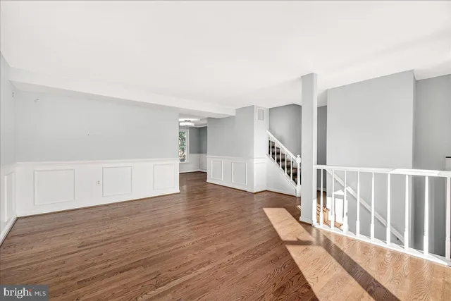 a view of entryway with wooden floor