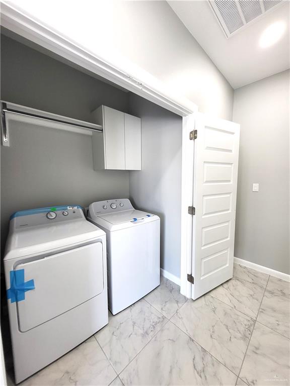 1416 East Hibiscus Avenue, Unit 3 McAllen, TX 78501 - Photo 11 of 11 a utility room with dryer and washer