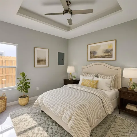 a bedroom with bed flowers and window