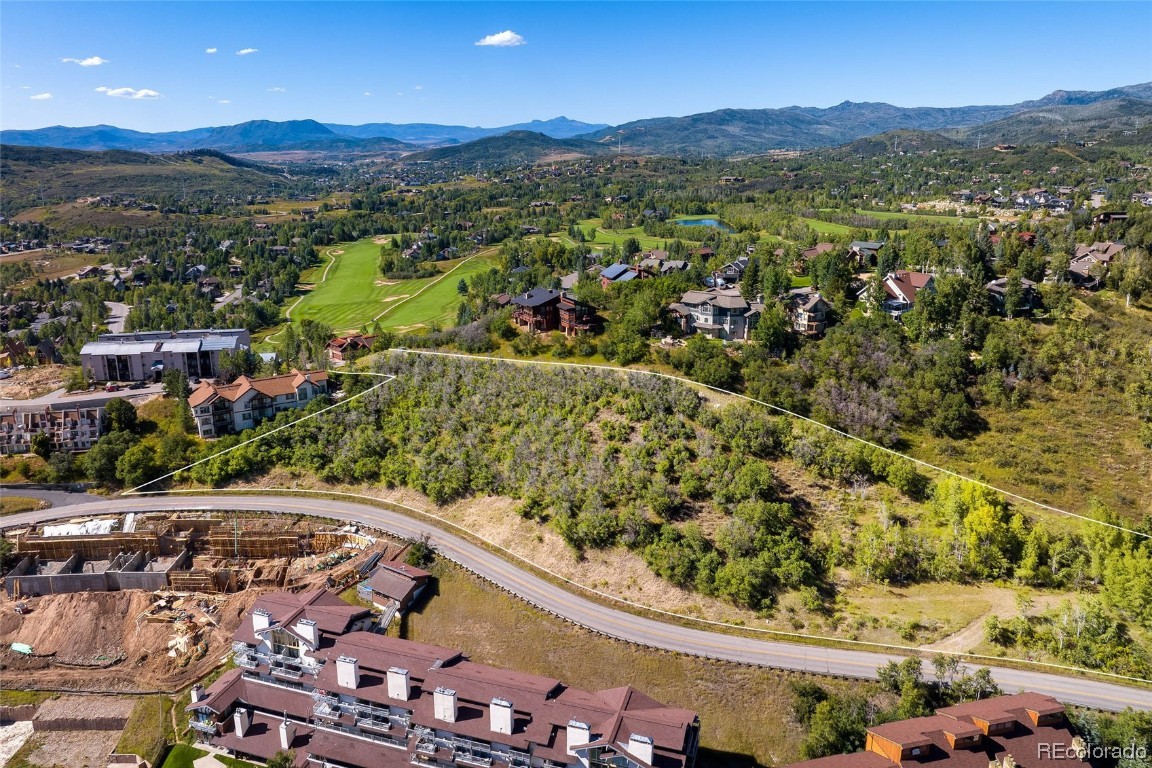 1 Burgess Creek Road Steamboat Springs, CO 80487 - Photo 3 of 8 a view of a city with mountains in the background