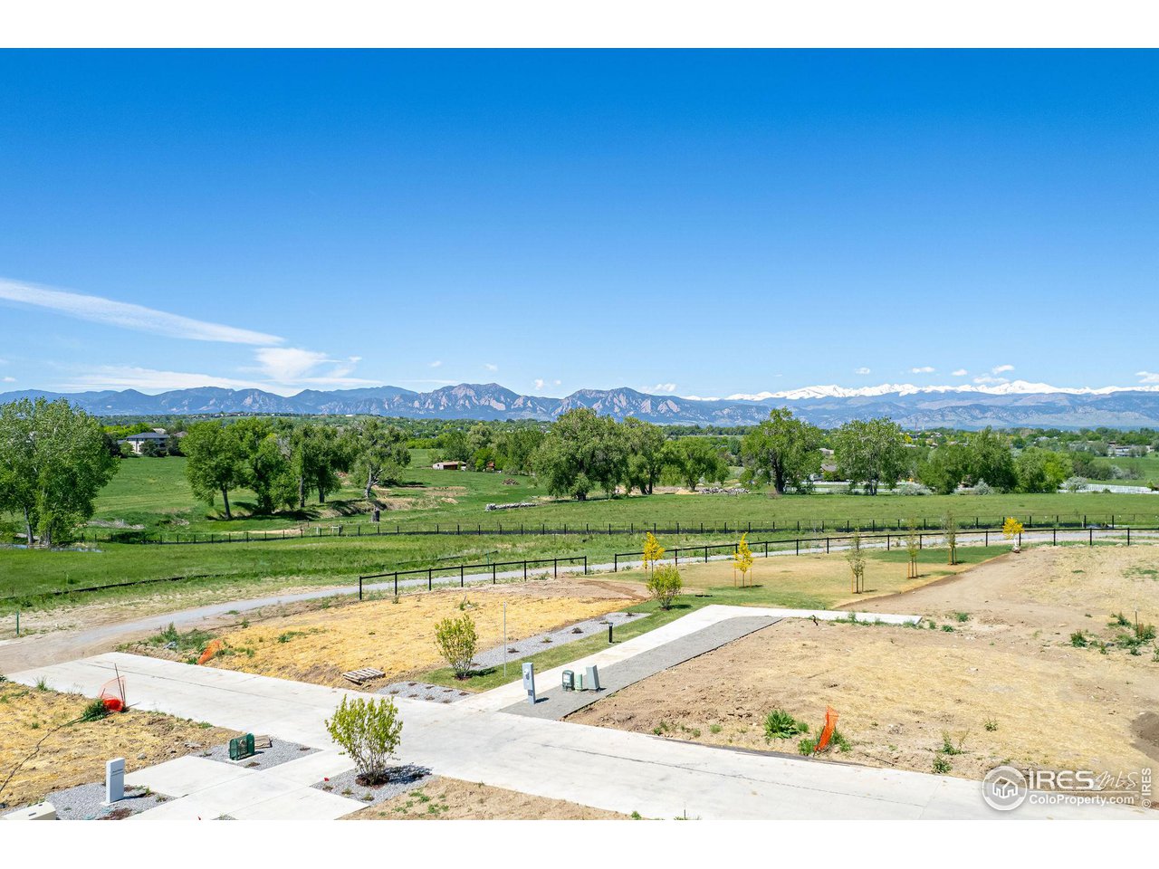 1642 Benjamin Lane Lafayette, CO 80026 - Photo 5 of 15 a view of a swimming pool and a yard