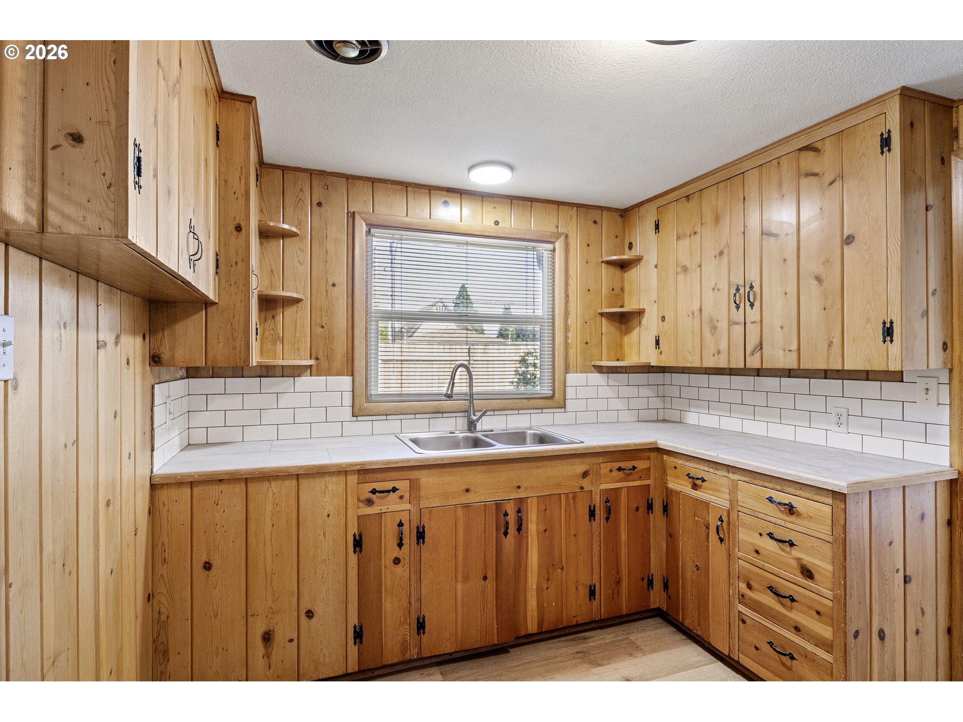 1008 Coburg Road Eugene, OR 97401 - Photo 35 of 46 a kitchen with a sink and cabinets