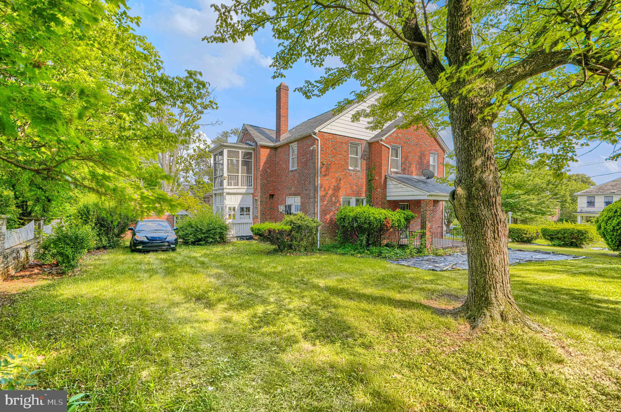 3212 Dorchester Road Baltimore, MD 21215 - Photo 4 of 45 a front view of a house with garden