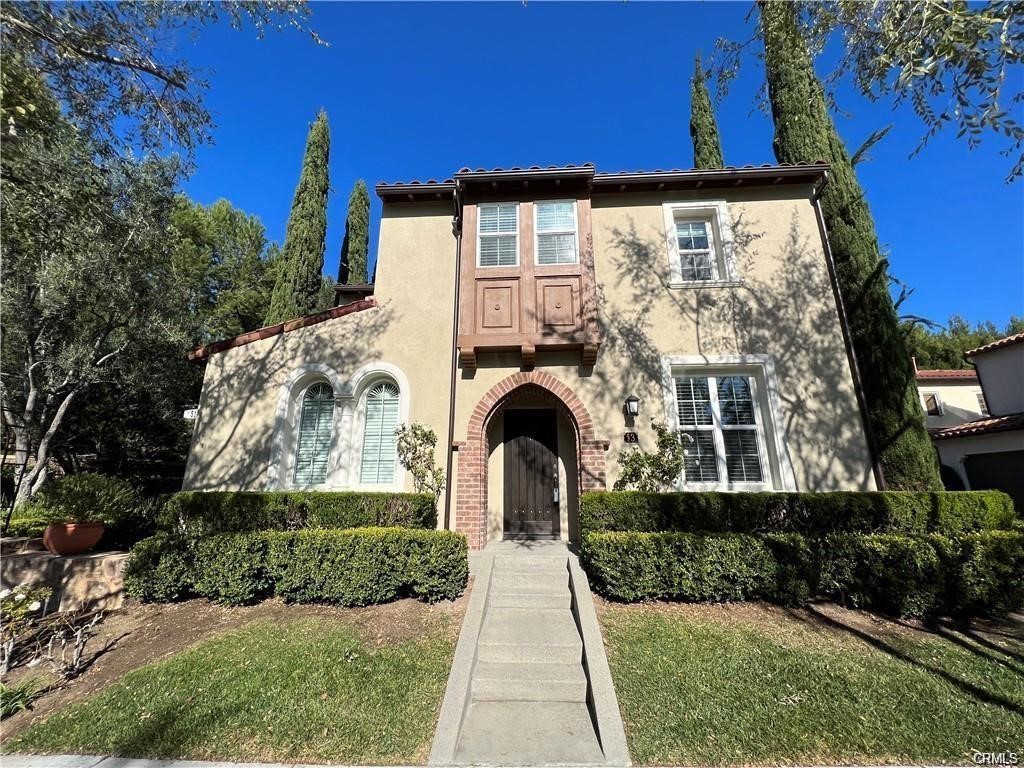 53 Bellwind Irvine, CA 92603 - Photo 2 of 12 a front view of a house with a yard