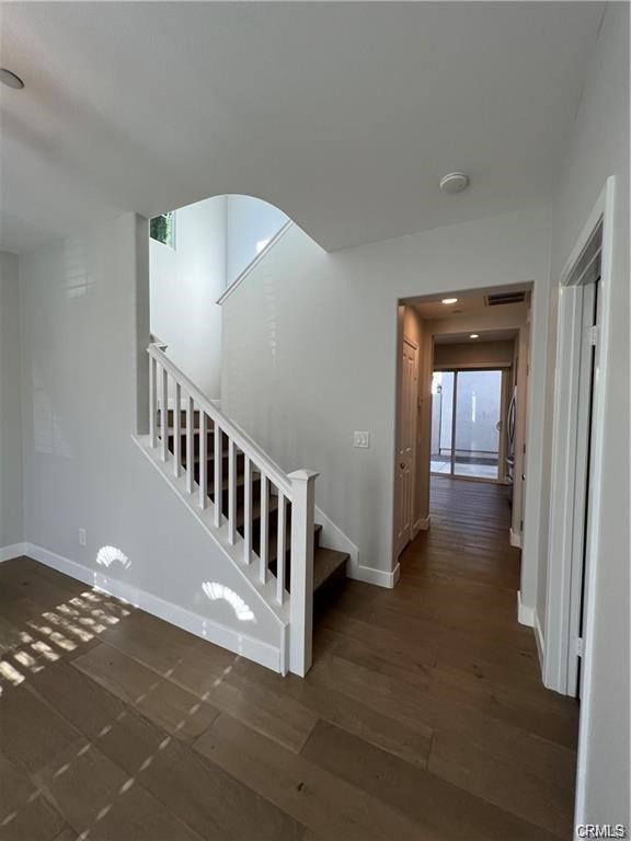 53 Bellwind Irvine, CA 92603 - Photo 9 of 12 a view of a hallway with staircase