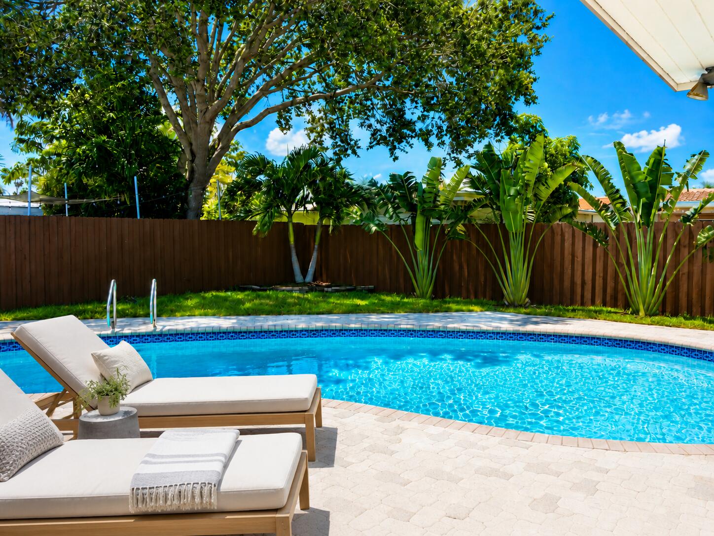 4815 Cleveland Street Hollywood, FL 33021 - Photo 27 of 31 a view of backyard with swimming pool and seating
