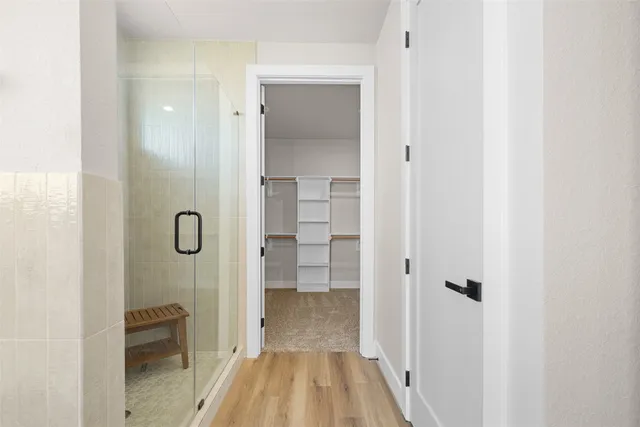 a bathroom with a sink and a shower