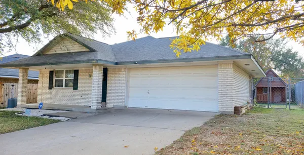 a small white house with a outdoor space