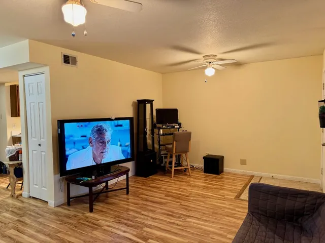 a view of a workspace with furniture