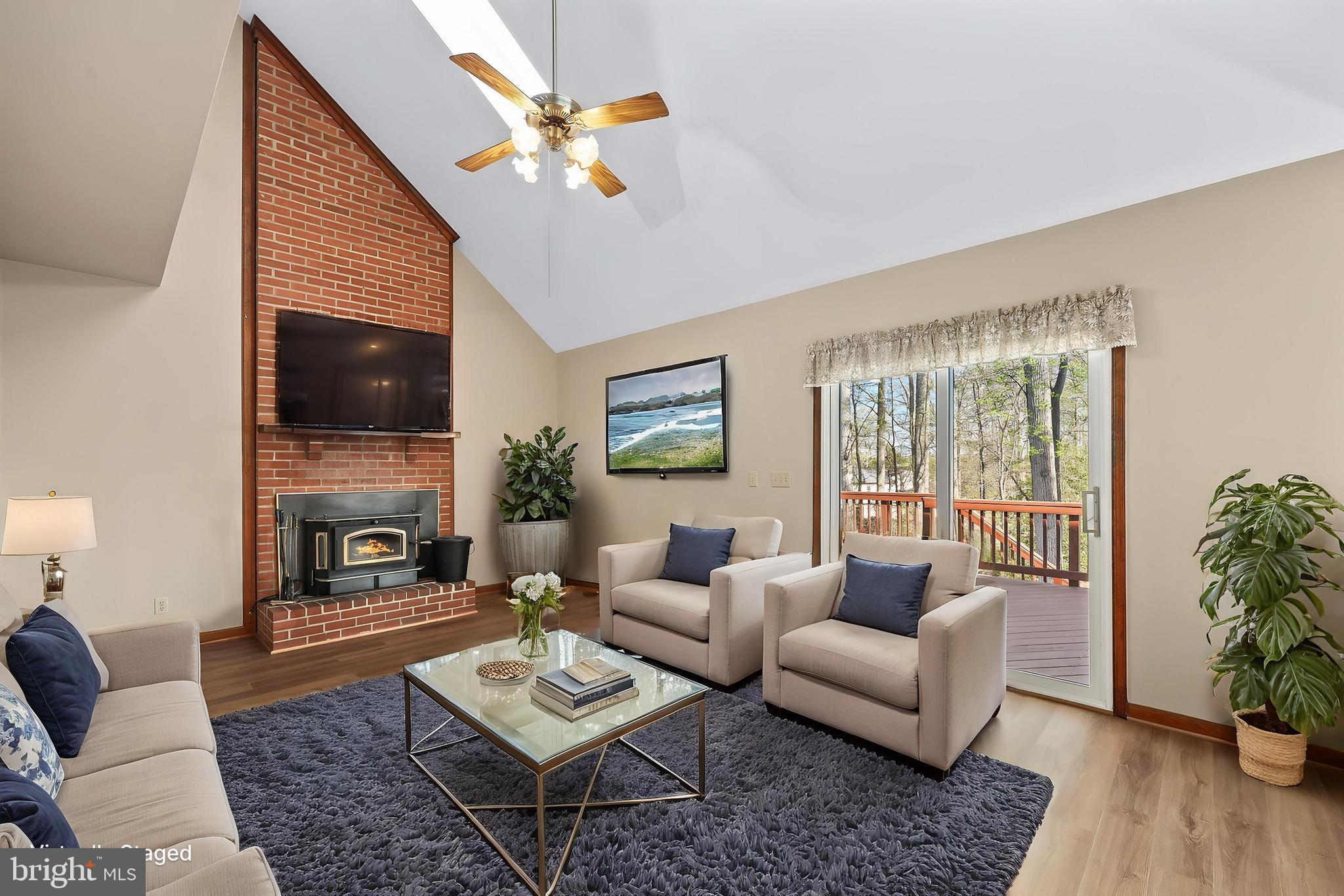 233 Choptank Road Stafford, VA 22556 - Photo 16 of 65 a living room with furniture and a fireplace