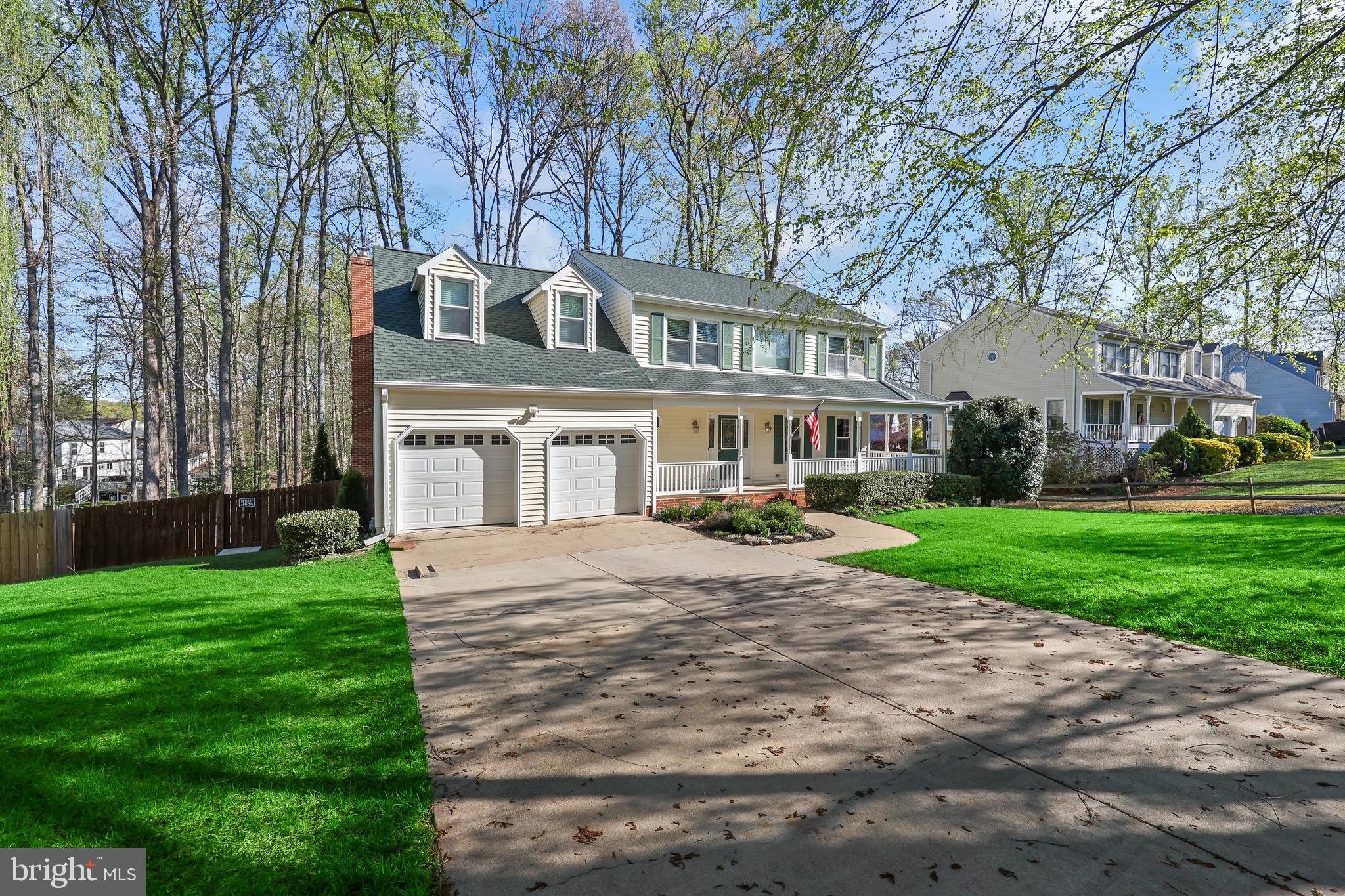 233 Choptank Road Stafford, VA 22556 - Photo 2 of 65 a front view of a house with yard and green space