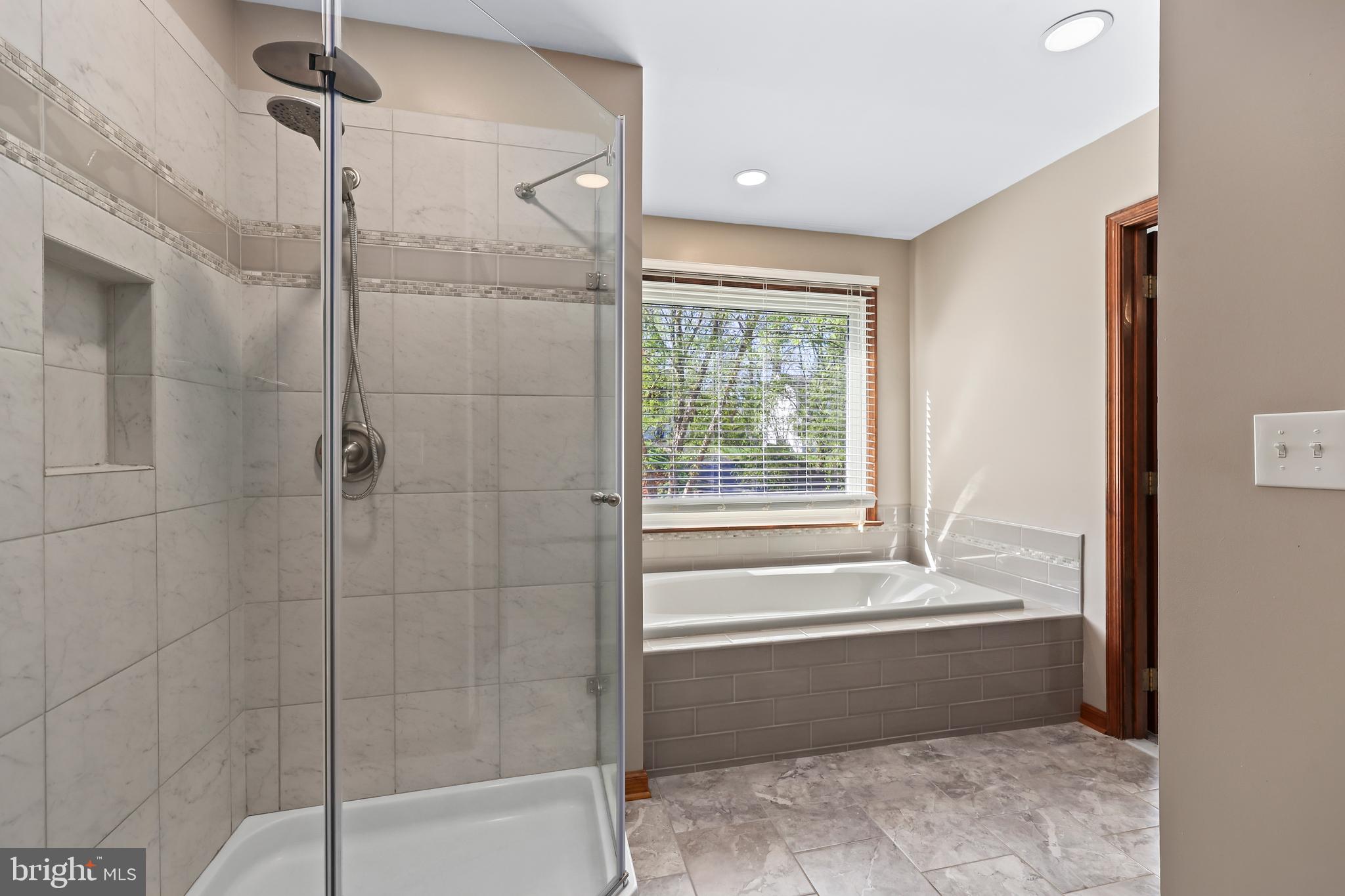 233 Choptank Road Stafford, VA 22556 - Photo 27 of 65 a bathroom with a bathtub and shower