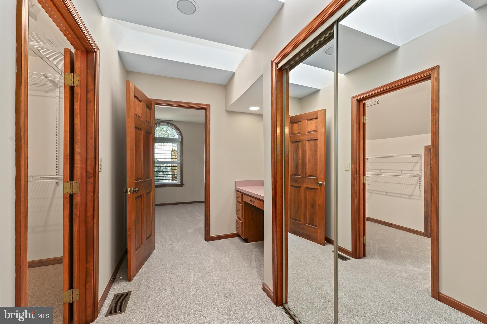 233 Choptank Road Stafford, VA 22556 - Photo 28 of 65 a view of a hallway with wooden floor and staircase